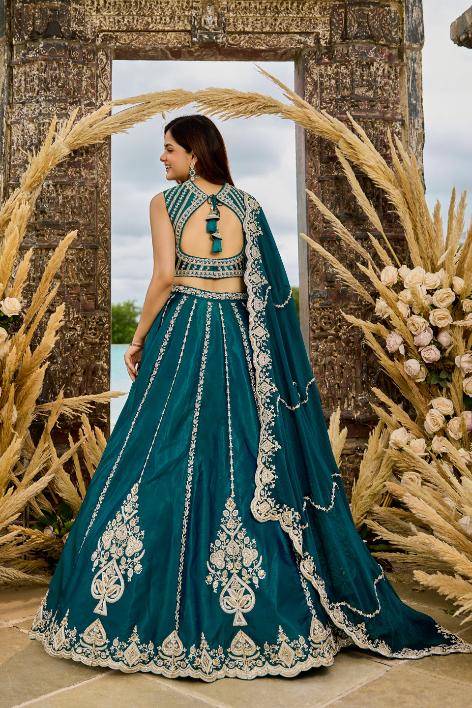 Neelkamal Dark Green Shimmer Lehenga Set